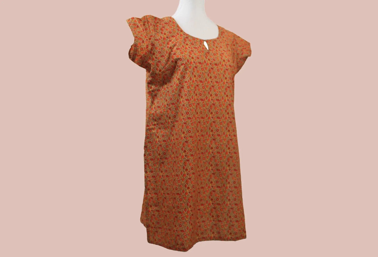 Orange and red printed kurta in casual cotton style from Muvvas Boutique.