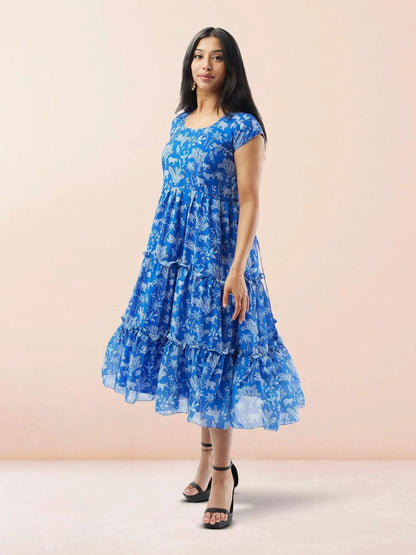 Blue Printed Chiffon Knee Length Tiered Dress | Muvvas Boutique Blue Printed Chiffon Knee Length Tiered Dress | Muvvas Boutique